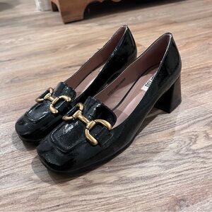 Elegant Black Heels with Gold Buckle